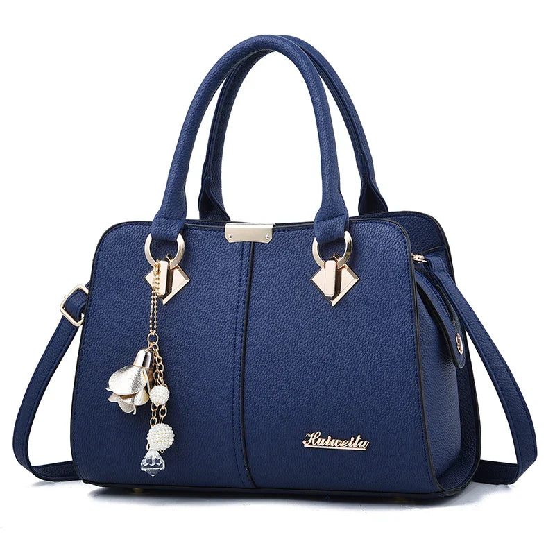 Bolsa feminina em couro queenly